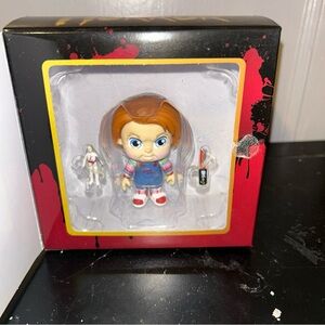Funko Chucky Action Figure with Red Hair and Blue Outfit